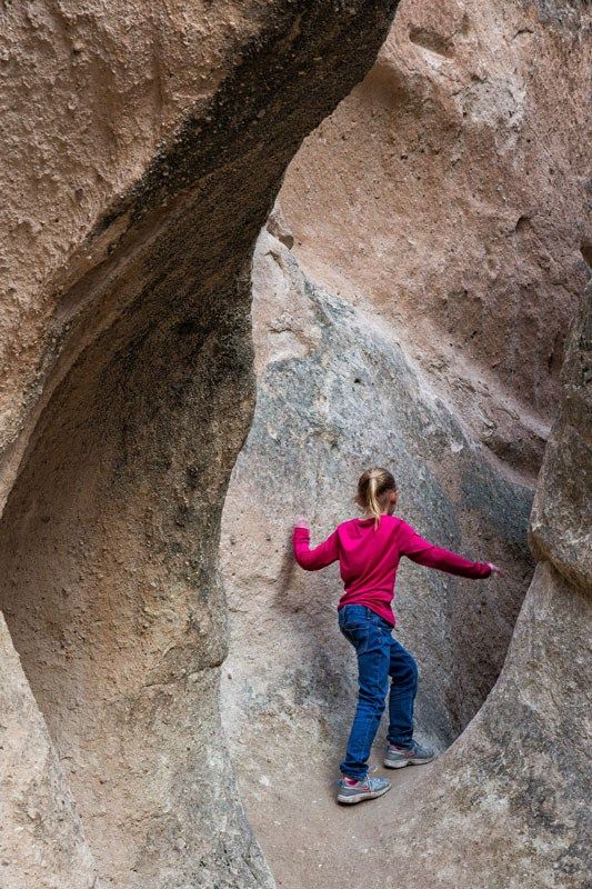 Kara exploring caves at Monks Valley in Pasabag, Cappadocia, Turkey.