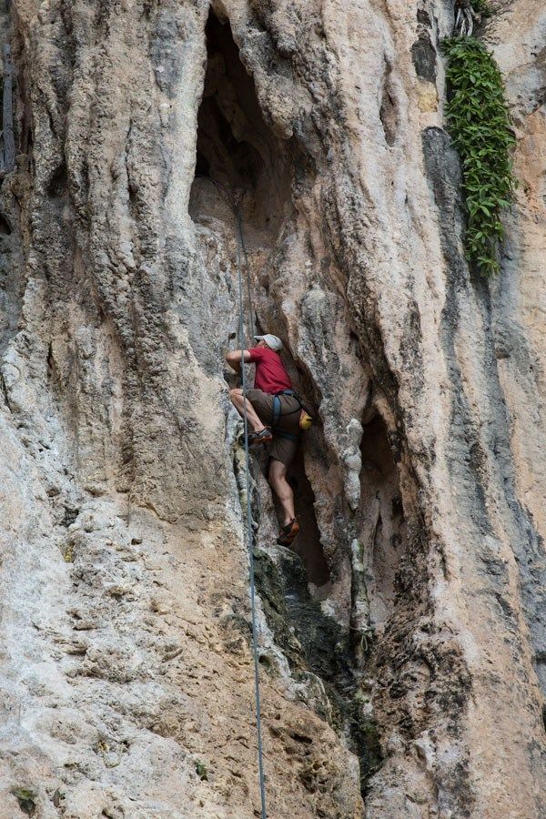 Tim rock climbing