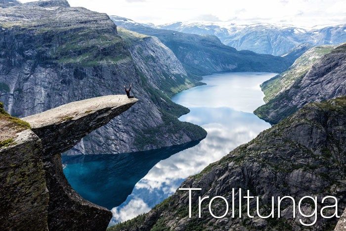 A person on the edge of the Trolltunga (Troll's Tongue) in Norway.