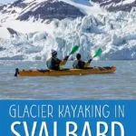 Glacier kayaking in Svalbard, Norway. Kayak in front of an active glacier on a day trip from Longyearbyen.