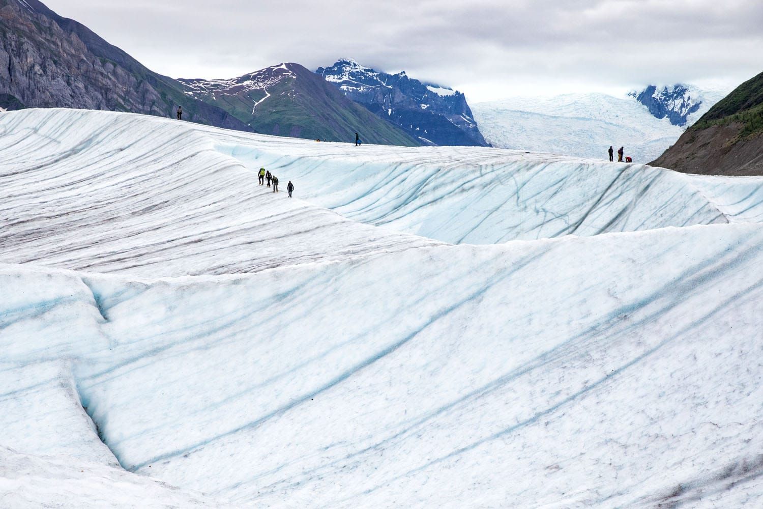 Hikers on the Root Glacier | Best National Parks in June