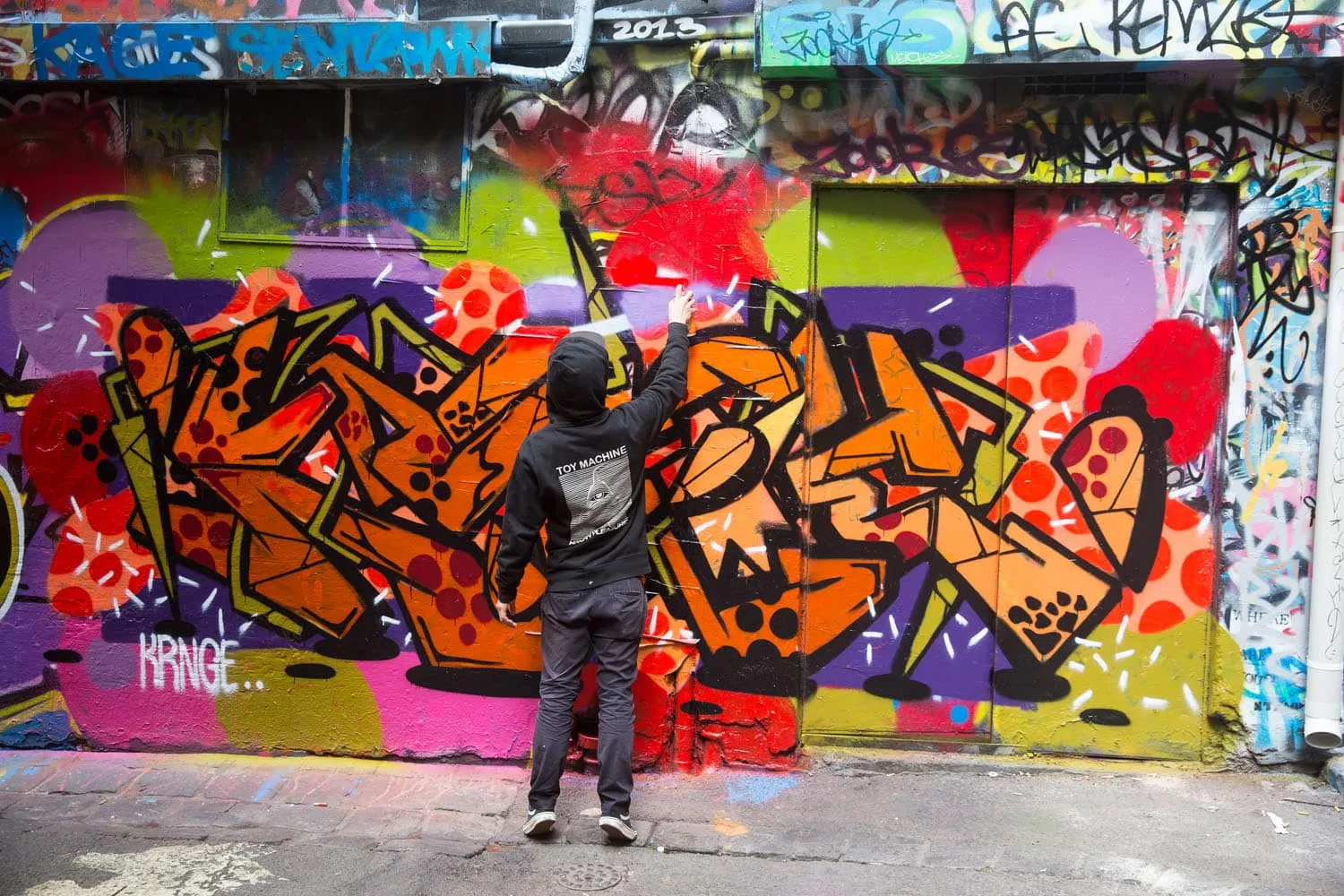 Graffiti Artist At Work on Hosier Lane